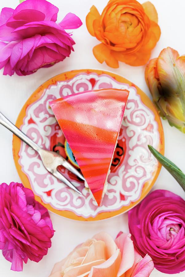 A Slice Of Mirror Glaze Cheesecake On A Plate Photograph by Lucy Parissi