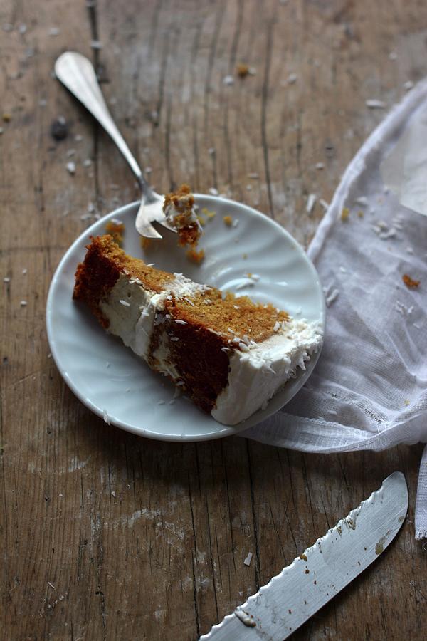 A Slice Of Moist Orange Cake With A Ginger And Cream Cheese Frosting Photograph by Pilar Felix