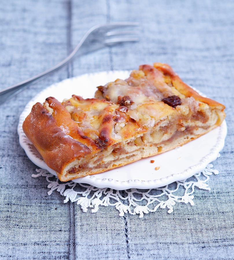 A Slice Of Nuts And Raisin Pastry Photograph by Udo Einenkel