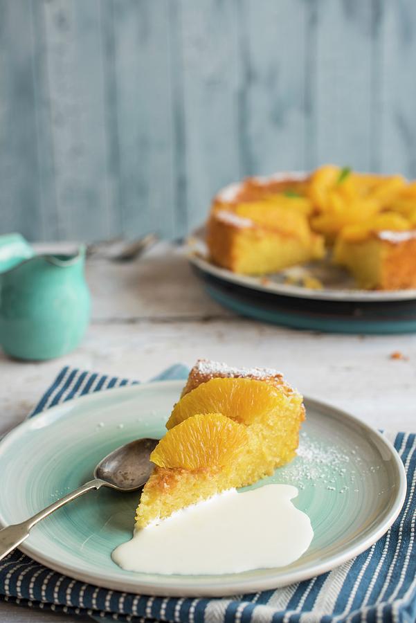 A Slice Of Orange Cake With Cream Photograph by Magdalena Hendey