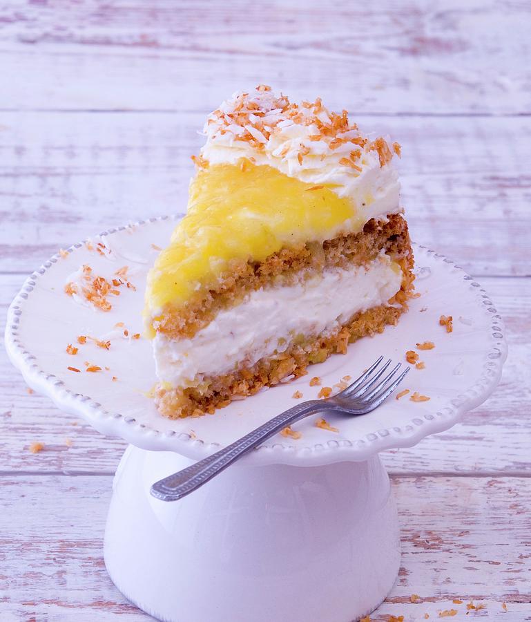 A Slice Of Pineapple Cake With Cream On A Cake Stand Photograph by Udo Einenkel