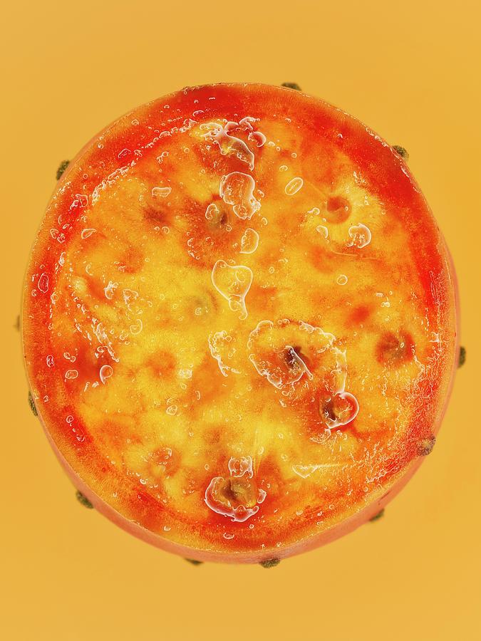 A Slice Of Prickly Pear On An Orange Surface, Close-up Photograph by Oliver Lippert