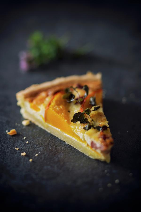 A Slice Of Pumpkin Quiche With Bacon And Parmesan Cheese Photograph by Jan Wischnewski