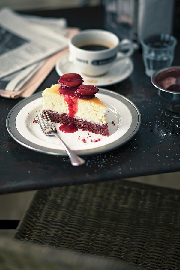 A Slice Of Red Velvet Cheesecake With Plums Photograph by Jalag / Wolfgang Schardt