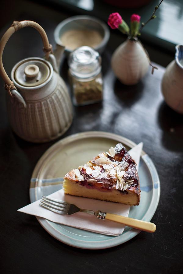 A Slice Of Ricotta Almond Cake With Plums Photograph by Helen Cathcart