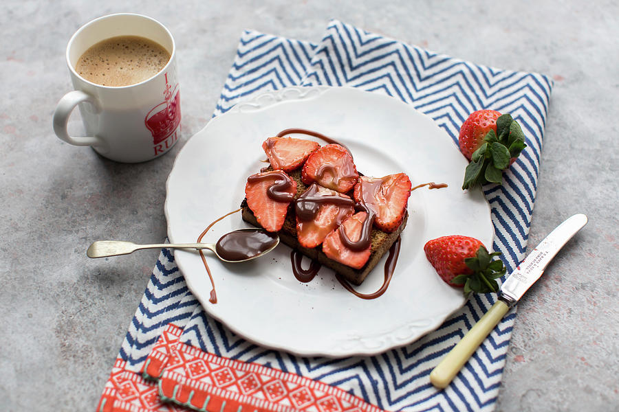 A Slice Of Rye Bread Topped With Strawberries And Drizzled With Chocolate Sauce Photograph by Lara Jane Thorpe