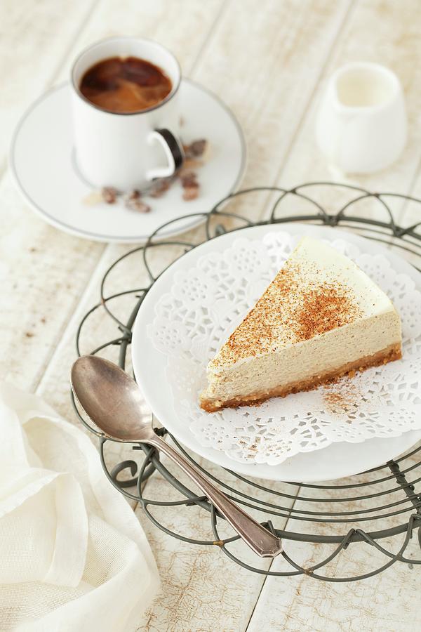 A Slice Of Spiced Cheesecake With Coffee Photograph by Jane Saunders