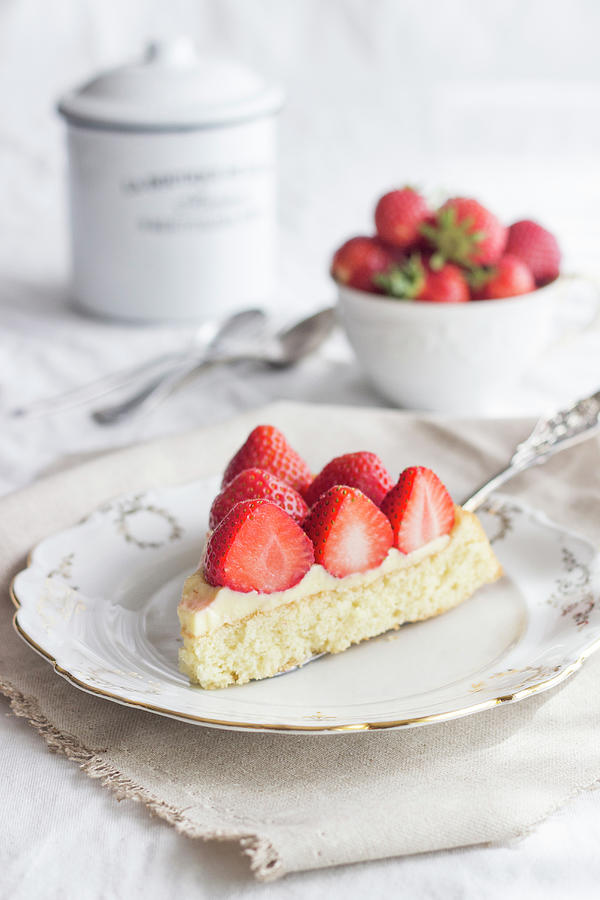 A Slice Of Strawberry Cake Topped With Set Custard Photograph by Tamara Staab