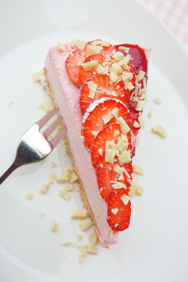 A Slice Of Strawberry Yoghurt Cake On A Biscuit Base With Fresh Strawberries And White Chocolate Photograph by Esther Hildebrandt
