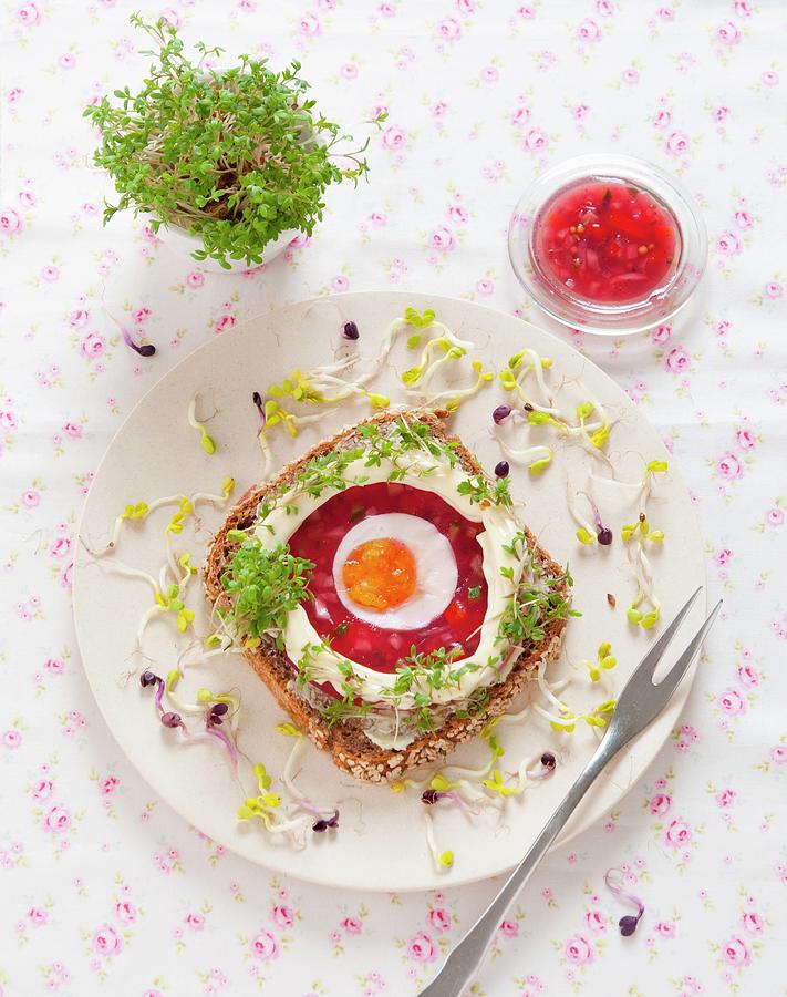 A Slice Of Wholemeal Bread Topped With Beetroot Aspic, Egg, Mayonnaise, Cress And Radish Sprouts Photograph by Udo Einenkel