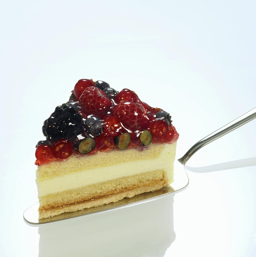 A Slice Of Wild Berry Cake On A Cake Slice Photograph by Brigitte Wegner