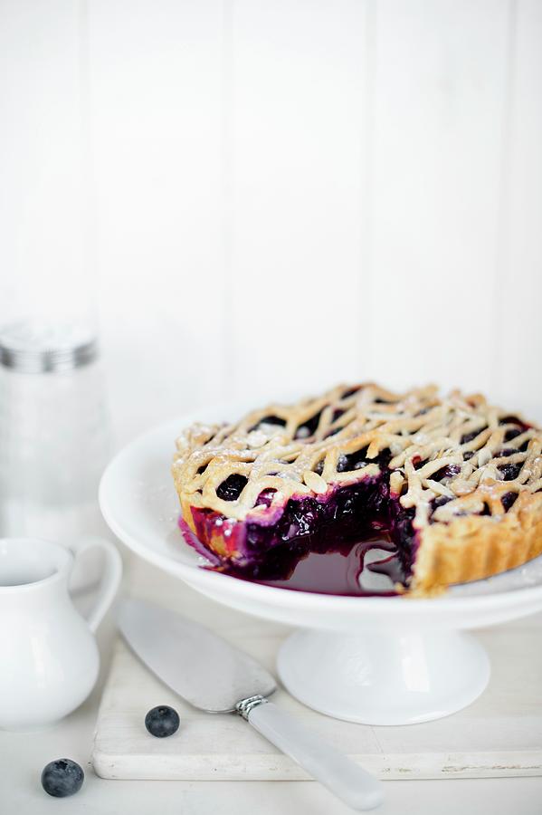 A Sliced Blueberry Pie On A Cake Stand Photograph by Magdalena Hendey