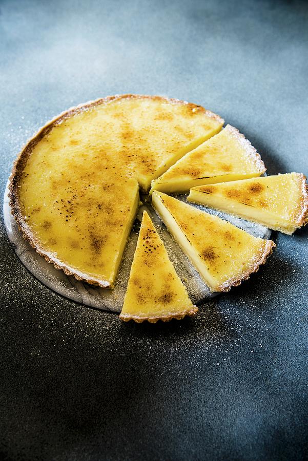 A Sliced Sugar-glazed Lemon Tart Photograph by Magdalena Hendey