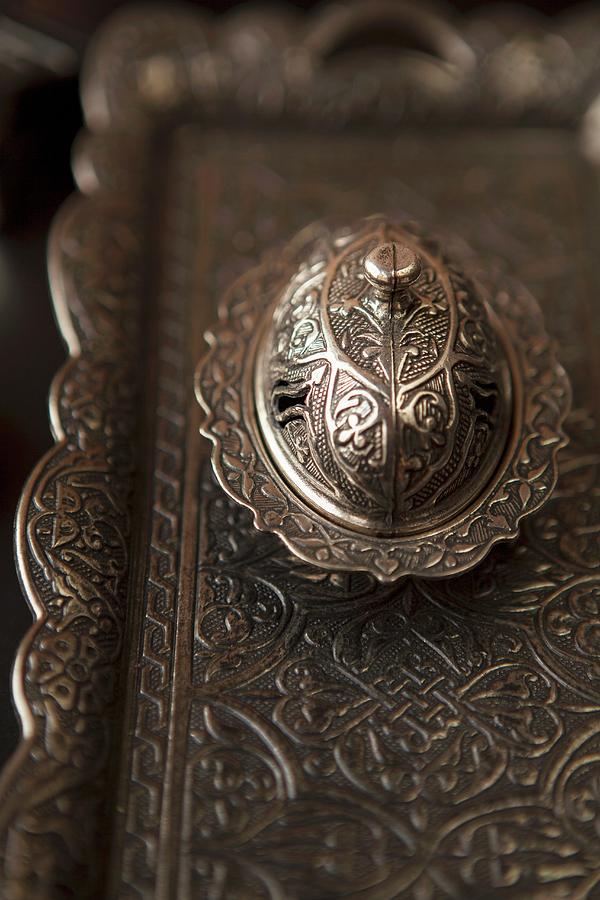 A Small Embossed Metal Tin And A Tray Photograph by Nika Moskalenko