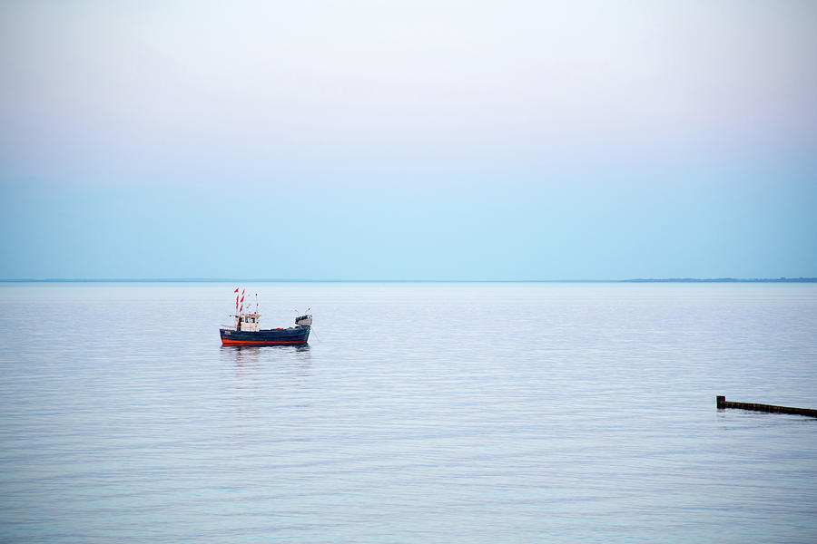 A Small Fishing Boat On The Sea by Karsten Eggert