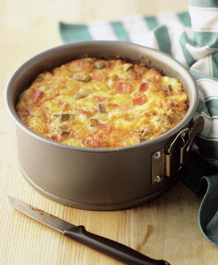 A Small Vegetable Cake With Bacon In A Spring-form Cake Tin Photograph by Michael Wissing
