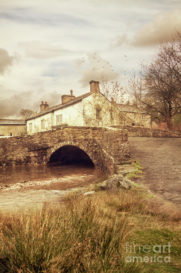 A Small Village Scene With A Cottage And Bridge Photograph by Ethiriel Photography