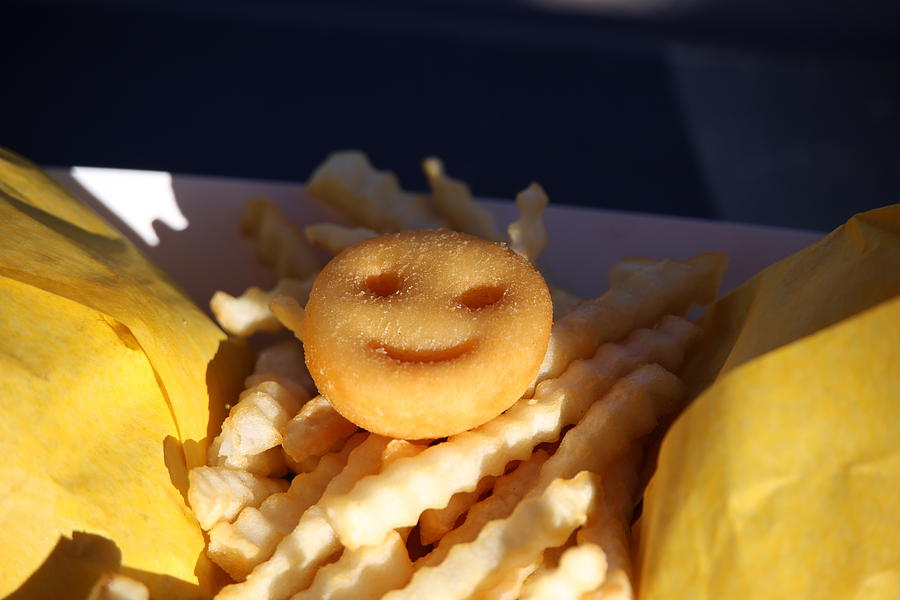 A Smile with French Fries Photograph by Laura Smith