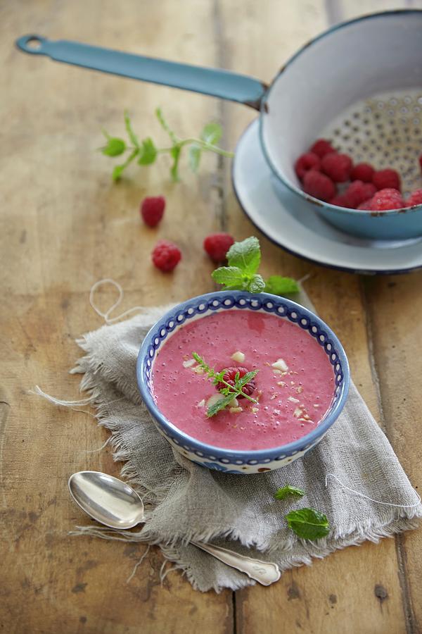 A Smoothie Bowl With Raspberries And Banana Photograph by Jo Kirchherr