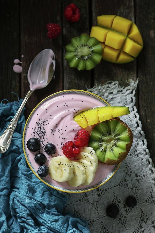 A Smoothie Bowl With Raspberry Yoghurt, Fresh Fruit And Poppy Seeds Photograph by Stacy Grant
