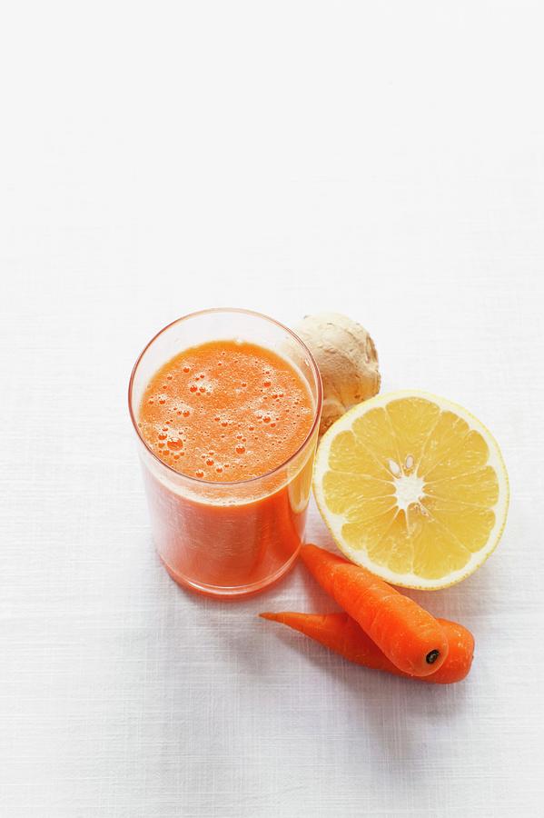 A Smoothie With Orange Juice, Carrots And Ginger Photograph by Sarka Babicka
