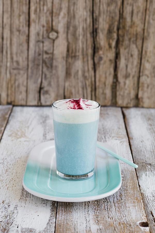 A Smurf Latte In A Glass Photograph by Tina Engel
