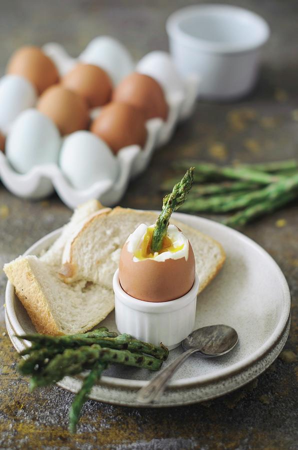 A Soft-boiled Egg With Asparagus And Toast Soldiers Photograph by Nick Sida