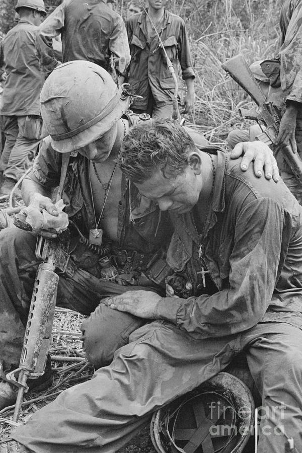 A Soldier Comforting Another Soldier by Bettmann