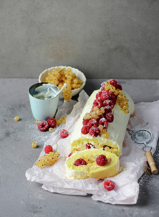 A Sponge Roll With Raspberries And White Currants Photograph by Ewgenija Schall
