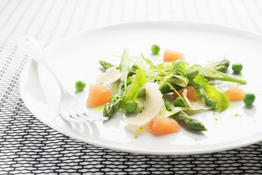 A Spring Salad With Asparagus, Parmesan, Peas, Grapefruit And Green Tomatoes Photograph by Gaelle Ap