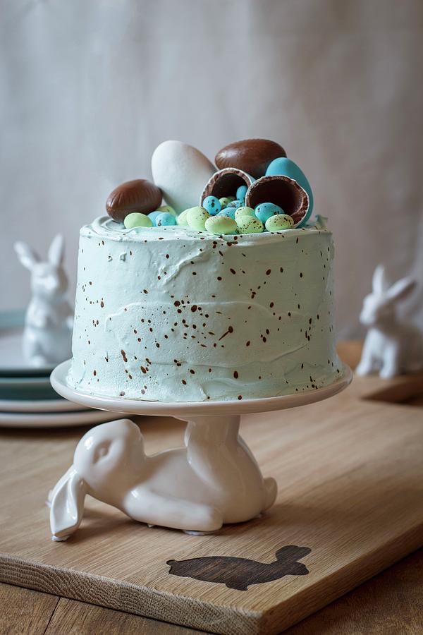 A Sprinkled Vanilla Cake With Filled With Marshmallows And Easter Eggs Photograph by Great Stock!