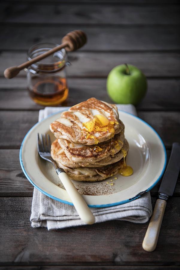 A Stack Of Apple Pancakes With Honey. Photograph by Magdalena Hendey