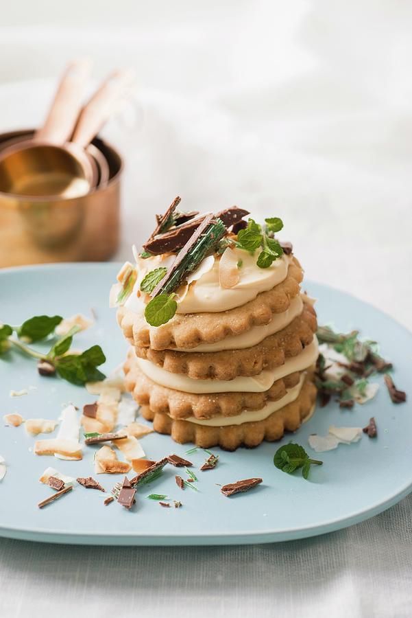 A Stack Of Biscuits With Mascarpone Cream And Peppermint Photograph by Great Stock!