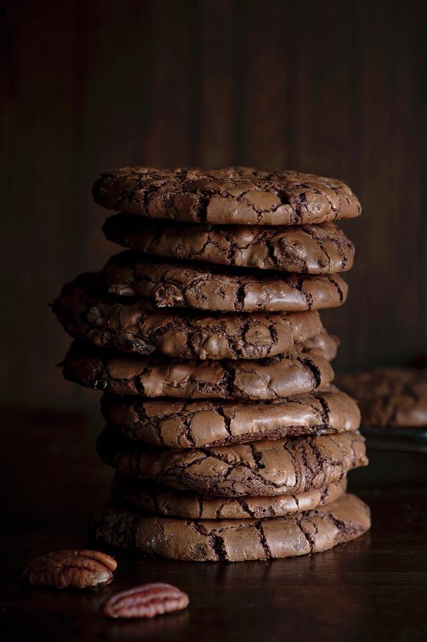A Stack Of Chocolate And Pecan Nut Cookies Photograph by Magdalena Hendey