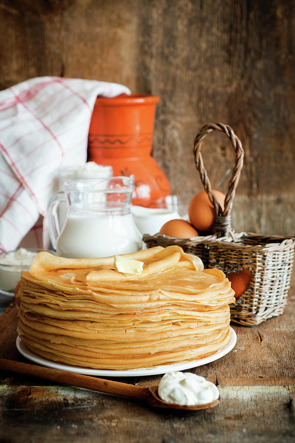 A Stack Of Crepes On A Plate Photograph by Irina Meliukh
