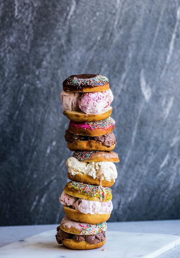 A Stack Of Doughnut Ice Cream Sandwiches Photograph by Hein Van Tonder