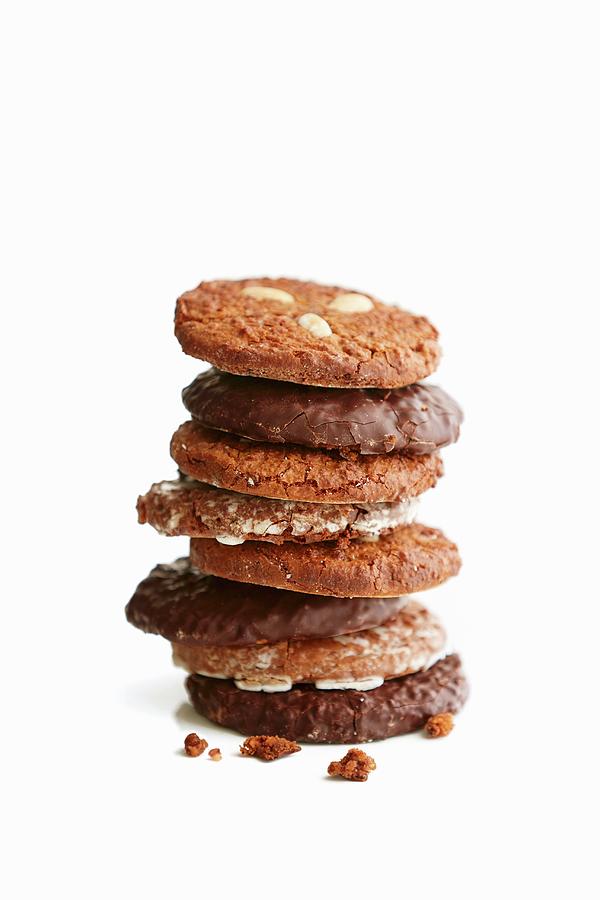 A Stack Of Gingerbread Cookies In Front Of A White Background Photograph by Jalag / Michael Bernhardi