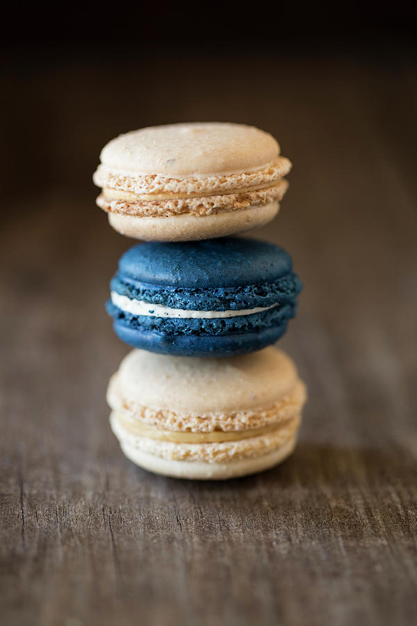 A Stack Of Macaroons Filled With Salted Caramel And Vanilla Cream Photograph by Nicole Godt