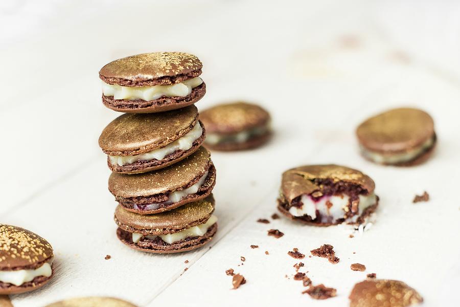 A Stack Of Macaroons With Gold Powder Photograph by Carolina Auer Photography