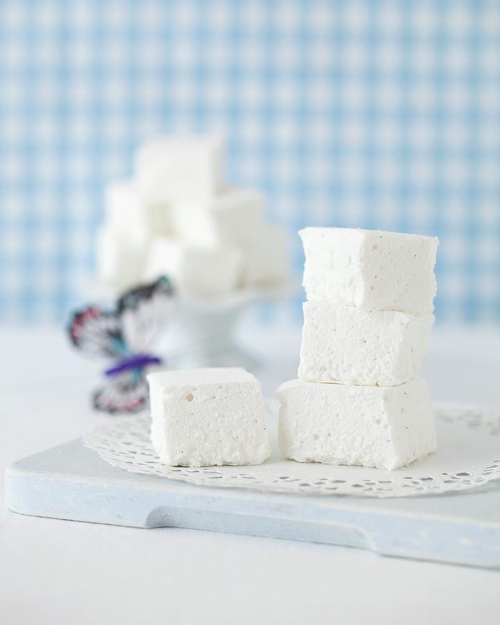 A Stack Of Marshmallows On A Doily Photograph by Jane Saunders