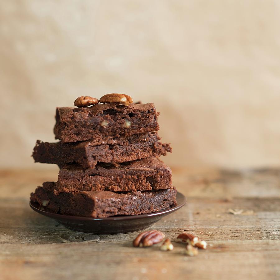 A Stack Of Pecan Nut Chocolate Brownies Photograph by Sonia Chatelain