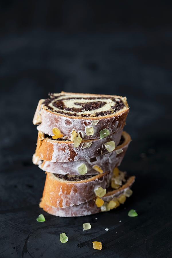 A Stack Of Poppy Seed Roll Cake Slices With Icing, Dried Fruit And Nuts poland Photograph by Malgorzata Laniak