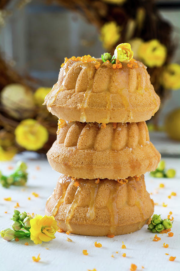 A Stack Of Three Mini Bundt Cakes With Honey Photograph by Joanna Lewicka