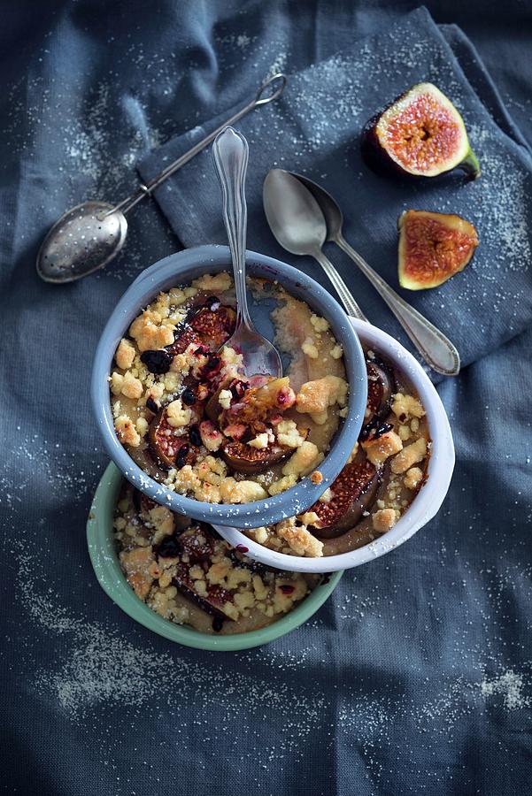 A Stack Of Three Ovenproof Dishes Of Vegan Baked Semolina Pudding With Figs, A Crumble Topping And Elderflower Jam Photograph by Kati Neudert