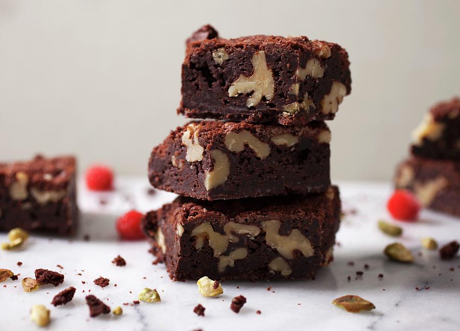 A Stack Of Three Walnut Brownies Photograph by Katharine Pollak