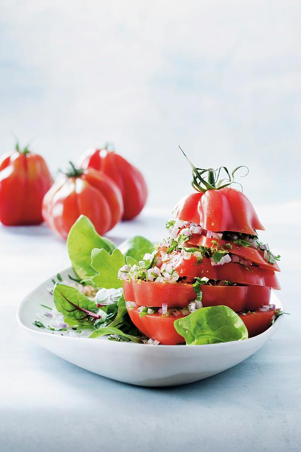 A Stack Of Tomatoes With A Coriander And Parsley Vinaigrette Photograph by Jalag / Jan C. Brettschneider