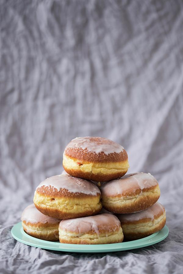 A Stack Of Traditional Polish Doughnuts Filled With Marmalade Photograph by Malgorzata Laniak