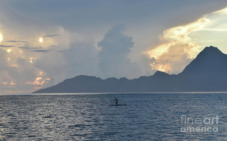 A Stand Up Paddler At Sunset.  The  Polynesian Island Of Moorea In The Background. Photograph by Tom Wurl