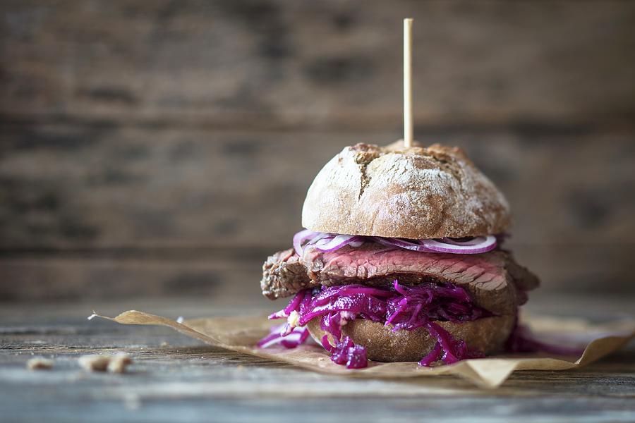 A Steak Burger With Red Cabbage Photograph by Jan Wischnewski