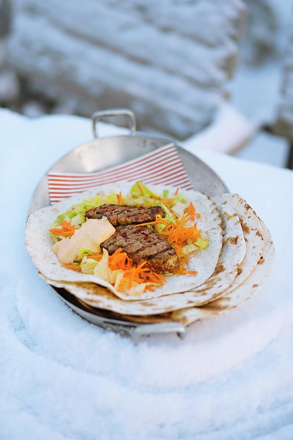 A Steak Wrap With A Carrot And Iceberg Lettuce Salad Photograph by Jalag / Wolfgang Schardt